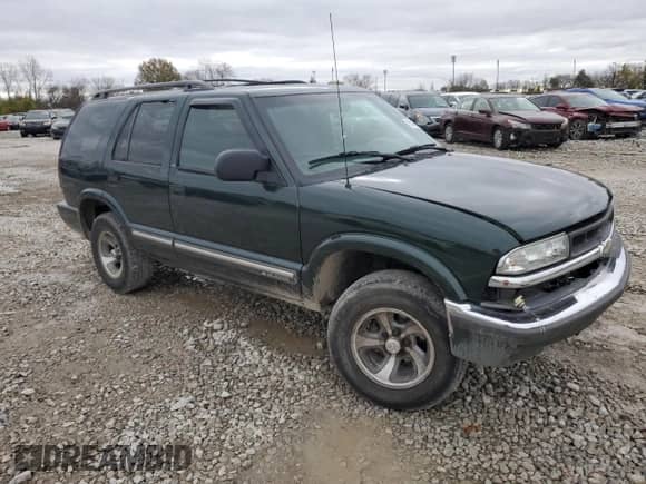 2001 Chevrolet Blazer LS с VIN 1GNCS13W91K254624, выставлен на аукционе Copart как лот 80281444 с пробегом 189 843 миль миль и Списание • Salvage title. История ставок и продаж доступна на DreamBid. Изображение 4.