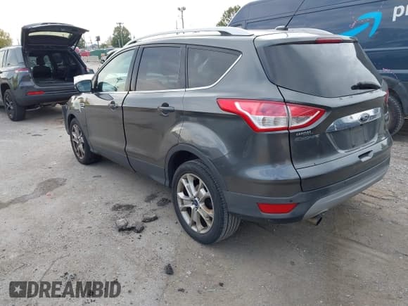 ✅ 2015 Ford Escape Titanium • VIN: 1FMCU0JX8FUB71346 • Lot: 43558511. Listed on IAAI with 127,729 mi. Free auction sales archive from the USA and detailed vehicle history report at DreamBid. Image 3.