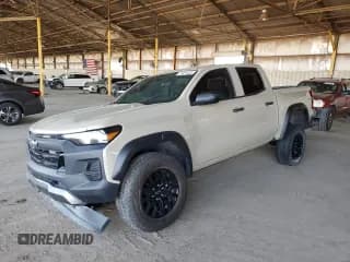 ✅ 2023 Chevrolet Colorado 4WD Trail Boss • VIN: 1GCPTEEK5P1127327 • Лот: 71821455. Опубликован ранее на Copart с пробегом 41 238 миль. Бесплатный доступ к архиву аукционных продаж из США и подробный отчёт об истории автомобиля на DreamBid. Изображение 1.
