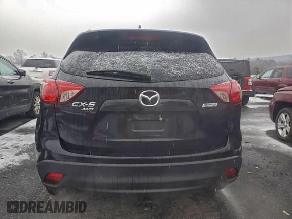 ✅ 2016 Mazda CX-5 Grand Touring • VIN: JM3KE4DY9G0886287 • Lot: 96258785. Wystawiony na Copart z przebiegiem 136 186 mil. Bezpłatny archiwum sprzedaży aukcyjnych z USA i szczegółowy raport historii pojazdu na DreamBid. Zdjęcie 6.