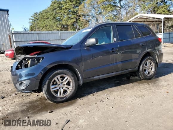 ✅ 2012 Hyundai Santa Fe GLS • VIN: 5XYZG4AG1CG154401 • Lot: 82873394. Listed on Copart with 267,184 mi. Free auction sales archive from the USA and detailed vehicle history report at DreamBid. Image 1.