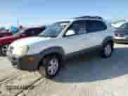 2007 Hyundai Tucson SE z VIN KM8JN12D47U641209, wystawiony jako Copart lot #77636264 z przebiegiem Nie podano mil oraz Szkoda całkowita • Salvage title. Historia ofert i sprzedaży dostępna na DreamBid. Obrazek 1.