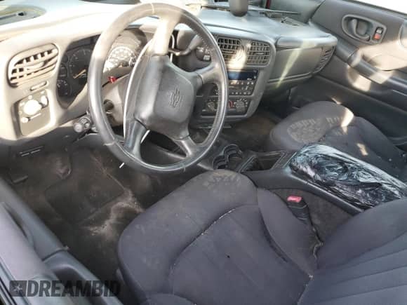 2003 Chevrolet S-10 LS с VIN 1GCDT19X738161613, выставлен на аукционе Copart как лот 76323204 с пробегом Не указан миль и Списание • Salvage title. История ставок и продаж доступна на DreamBid. Изображение 8.