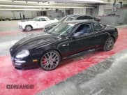 ✅ 2005 Maserati GranSport • VIN: ZAMEC38A450015048 • Lot: 54171845. Listed on Copart with 37,725 mi. Free auction sales archive from the USA and detailed vehicle history report at DreamBid. Image 1.