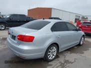 ✅ 2013 Volkswagen Jetta SE • VIN: 3VWDX7AJXDM373706 • Lot: 42161655. Listed on IAAI with 202,471 mi. Free auction sales archive from the USA and detailed vehicle history report at DreamBid. Image 4.