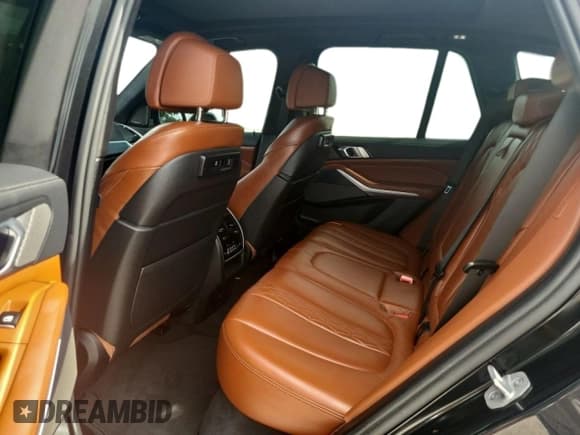 ✅ 2021 BMW X5 M50i • VIN: 5UXJU4C02M9F40464 • Лот: 90140945. Опубликован ранее на Copart с пробегом 53 720 миль. Бесплатный доступ к архиву аукционных продаж из США и подробный отчёт об истории автомобиля на DreamBid. Изображение 6.