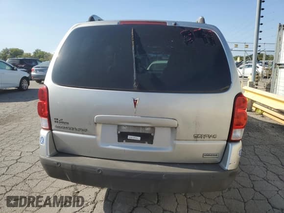 ✅ 2006 Pontiac Montana • VIN: 1GMDX33L06D151373 • Lot: 70697324. Wystawiony na Copart z przebiegiem Nie podano. Bezpłatny archiwum sprzedaży aukcyjnych z USA i szczegółowy raport historii pojazdu na DreamBid. Zdjęcie 6.