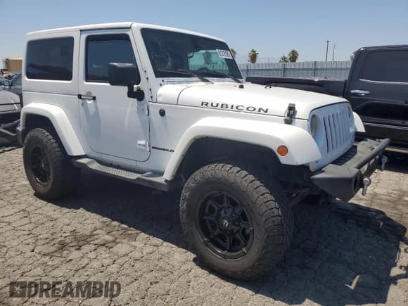 ✅ 2015 Jeep Wrangler Rubicon Hard Rock • VIN: 1C4BJWCG5FL561397 • Lot: 61218185. Listed on Copart with 164,240 mi. Free auction sales archive from the USA and detailed vehicle history report at DreamBid. Image 4.