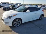 ✅ 2013 Hyundai Veloster w/Gray Int • VIN: KMHTC6AD6DU167644 • Лот: 78494714. Опубликован ранее на Copart с пробегом 103 076 миль. Бесплатный доступ к архиву аукционных продаж из США и подробный отчёт об истории автомобиля на DreamBid. Изображение 1.