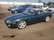 ✅ 2003 Jaguar XK • VIN: SAJDA42C532A36020 • Lot: 60656805. Wystawiony na Copart z przebiegiem 65 020 mil. Bezpłatny archiwum sprzedaży aukcyjnych z USA i szczegółowy raport historii pojazdu na DreamBid. Zdjęcie 1.