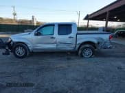 ✅ 2016 Nissan Frontier S • VIN: 1N6AD0EV0GN767161 • Lot: 41566094. Listed on IAAI with 99,638 mi. Free auction sales archive from the USA and detailed vehicle history report at DreamBid. Image 14.