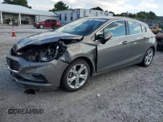 2017 Chevrolet Cruze Premier с VIN 3G1BF6SM7HS558936, выставлен на аукционе Copart как лот 84368935 с пробегом 158 297 миль миль и Списание • Salvage title. История ставок и продаж доступна на DreamBid. Изображение 1.