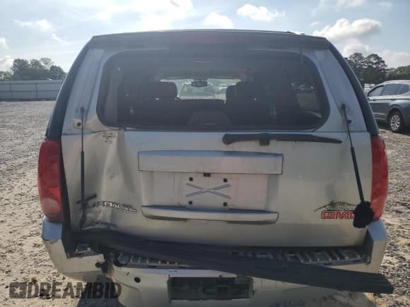 ✅ 2010 GMC Yukon XL SLT • VIN: 1GKUKKE3XAR207586 • Лот: 56592495. Опубликован ранее на Copart с пробегом 208 697 миль. Бесплатный доступ к архиву аукционных продаж из США и подробный отчёт об истории автомобиля на DreamBid. Изображение 6.