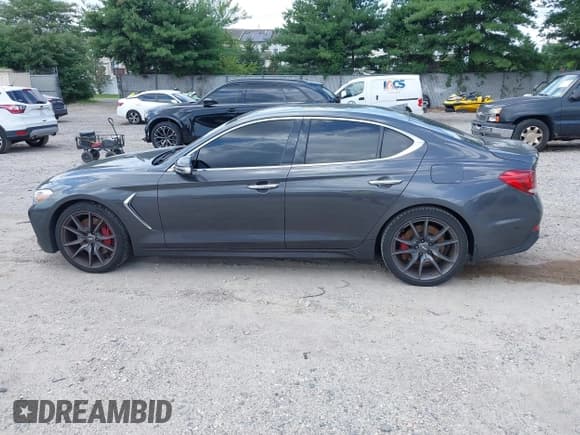 ✅ 2019 Genesis G70 Sport • VIN: KMTG24LAXKU030947 • Lot: 42702540. Listed on IAAI with 61,952 mi. Free auction sales archive from the USA and detailed vehicle history report at DreamBid. Image 13.