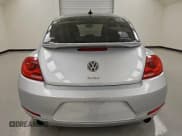✅ 2012 Volkswagen Beetle Turbo • VIN: 3VWVA7ATXCM653776 • Лот: 91445165. Опубликован ранее на Copart с пробегом 117 273 миль. Бесплатный доступ к архиву аукционных продаж из США и подробный отчёт об истории автомобиля на DreamBid. Изображение 6.