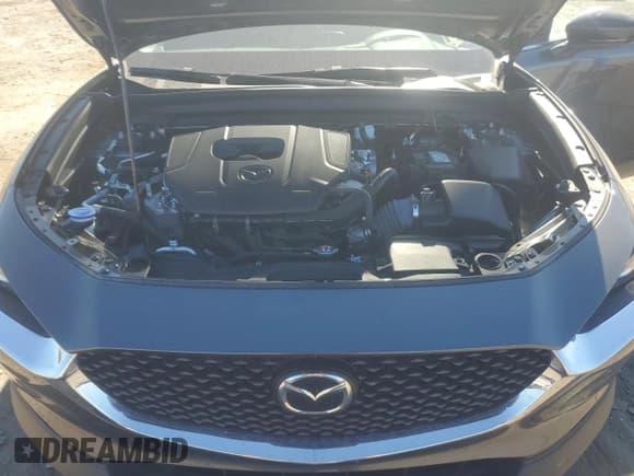 ✅ 2024 Mazda CX-30 S Select Sport • VIN: 3MVDMBBM8RM637180 • Лот: 82603705. Опубликован ранее на Copart с пробегом 10 401 миль. Бесплатный доступ к архиву аукционных продаж из США и подробный отчёт об истории автомобиля на DreamBid. Изображение 11.