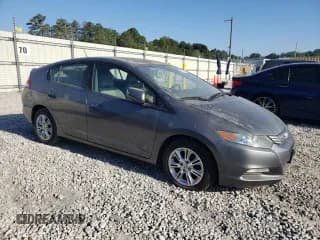 ✅ 2010 Honda Insight EX • VIN: JHMZE2H79AS039468 • Лот: 68737834. Опубликован ранее на Copart с пробегом 198 155 миль. Бесплатный доступ к архиву аукционных продаж из США и подробный отчёт об истории автомобиля на DreamBid. Изображение 4.