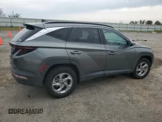 ✅ 2022 Hyundai Tucson SEL • VIN: 5NMJBCAE2NH141010 • Lot: 77138704. Wystawiony na Copart z przebiegiem 18 082 mil. Bezpłatny archiwum sprzedaży aukcyjnych z USA i szczegółowy raport historii pojazdu na DreamBid. Zdjęcie 3.