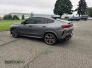 ✅ 2021 BMW X6 M50i • VIN: 5UXCY8C05M9E21862 • Lot: 86530975. Listed on Copart with 39,300 mi. Free auction sales archive from the USA and detailed vehicle history report at DreamBid. Image 3.