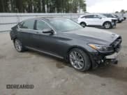 ✅ 2018 Genesis G80 3.8L • VIN: KMHGN4JE8JU223040 • Lot: 51564395. Listed on Copart with 62,708 mi. Free auction sales archive from the USA and detailed vehicle history report at DreamBid. Image 4.