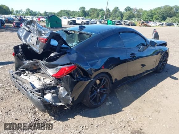 ✅ 2022 BMW 4 Series 430i • VIN: WBA53AP00NCH96487 • Lot: 42912009. Listed on IAAI with 31,330 mi. Free auction sales archive from the USA and detailed vehicle history report at DreamBid. Image 4.