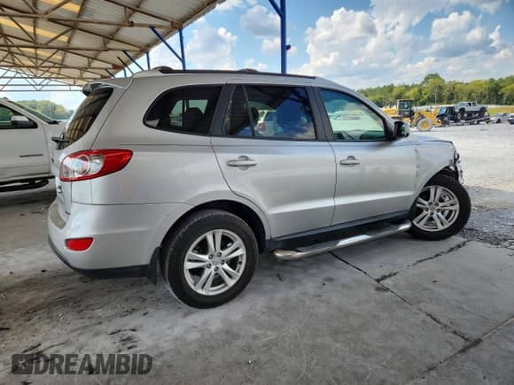 2012 Hyundai Santa Fe SE z VIN 5XYZHDAG9CG106013, wystawiony jako Copart lot #71472945 z przebiegiem 123 920 mil mil oraz Szkoda całkowita • Salvage title. Historia ofert i sprzedaży dostępna na DreamBid. Obrazek 3.