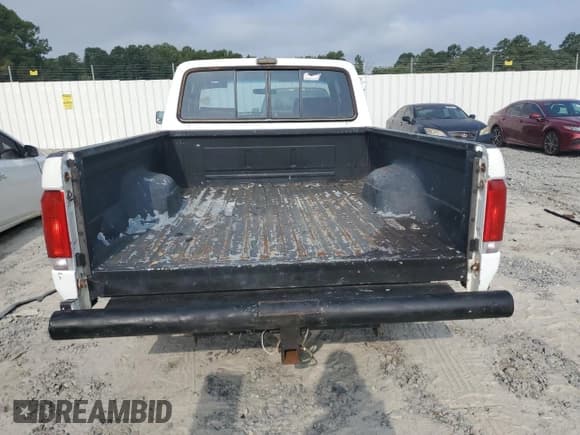 ✅ 1988 Ford F-150 • VIN: 1FTEX15N7JKA59029 • Лот: 69300355. Опубликован ранее на Copart с пробегом 98 141 миль. Бесплатный доступ к архиву аукционных продаж из США и подробный отчёт об истории автомобиля на DreamBid. Изображение 6.