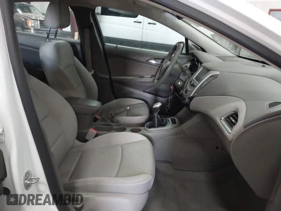 ✅ 2016 Chevrolet Cruze LS • VIN: 1G1BB5SMXG7272517 • Lot: 41283610. Listed on IAAI with 57,497 mi. Free auction sales archive from the USA and detailed vehicle history report at DreamBid. Image 5.