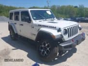 ✅ 2021 Jeep Wrangler Unlimited Rubicon • VIN: 1C4HJXFG5MW586842 • Lot: 42186683. Listed on IAAI with 76,450 mi. Free auction sales archive from the USA and detailed vehicle history report at DreamBid. Image 1.