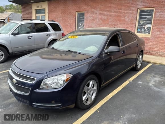 ✅ 2010 Chevrolet Malibu 1LS • VIN: 1G1ZB5EB6AF196056 • Lot: 53687215. Listed on Copart with 130,835 mi. Free auction sales archive from the USA and detailed vehicle history report at DreamBid. Image 2.