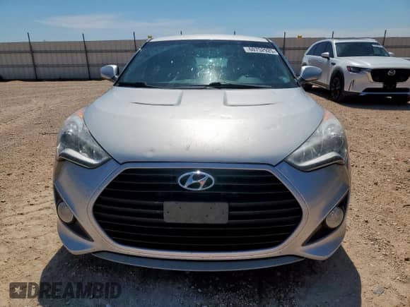 2015 Hyundai Veloster Turbo R-Spec z VIN KMHTC6AE5FU237176, wystawiony jako Copart lot #60752925 z przebiegiem 80 702 mil mil oraz Szkoda całkowita • Salvage title. Historia ofert i sprzedaży dostępna na DreamBid. Obrazek 5.