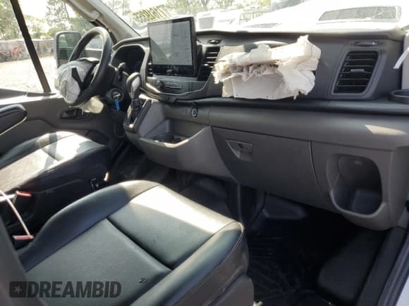 ✅ 2024 Ford Transit Cargo • VIN: 1FTBW3X86RKB26515 • Lot: 71619355. Listed on Copart with 84,600 mi. Free auction sales archive from the USA and detailed vehicle history report at DreamBid. Image 8.