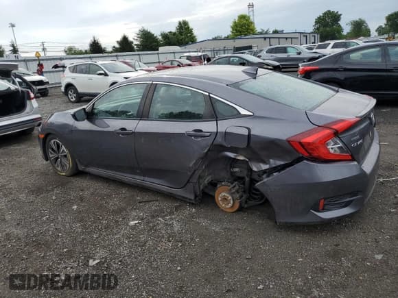 ✅ 2018 Honda Civic EX-L • VIN: 2HGFC1F89JH640839 • Лот: 63385345. Опубликован ранее на Copart с пробегом 88 538 миль. Бесплатный доступ к архиву аукционных продаж из США и подробный отчёт об истории автомобиля на DreamBid. Изображение 2.