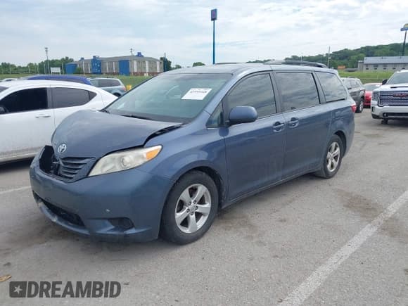 ✅ 2015 Toyota Sienna LE AAS • VIN: 5TDKK3DC3FS638001 • Lot: 42595168. Listed on IAAI with 143,301 mi. Free auction sales archive from the USA and detailed vehicle history report at DreamBid. Image 2.