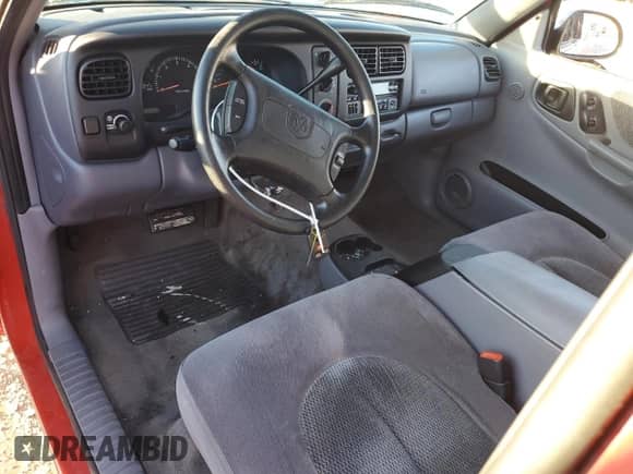 1998 Dodge Dakota SLT z VIN 1B7GL22Y9WS722696, wystawiony jako Copart lot #88701925 z przebiegiem Nie podano mil oraz Szkoda całkowita • Salvage title. Historia ofert i sprzedaży dostępna na DreamBid. Obrazek 8.