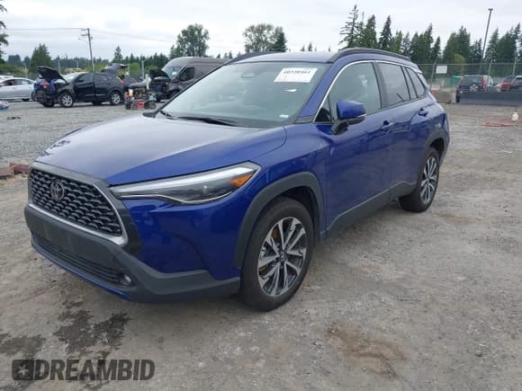 ✅ 2024 Toyota Corolla Cross XLE • VIN: 7MUEAABG4RV085704 • Lot: 40350461. Listed on IAAI with 15,986 mi. Free auction sales archive from the USA and detailed vehicle history report at DreamBid. Image 2.