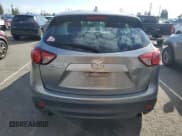 ✅ 2015 Mazda CX-5 Sport • VIN: JM3KE2BEXF0545136 • Лот: 93623125. Опубликован ранее на Copart с пробегом 172 330 миль. Бесплатный доступ к архиву аукционных продаж из США и подробный отчёт об истории автомобиля на DreamBid. Изображение 6.