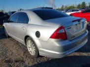 ✅ 2011 Ford Fusion Hybrid • VIN: 3FADP0L37BR335624 • Lot: 43479762. Listed on IAAI with 102,058 mi. Free auction sales archive from the USA and detailed vehicle history report at DreamBid. Image 3.