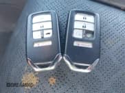 ✅ 2021 Honda Passport EX-L • VIN: 5FNYF8H54MB036555 • Lot: 42493765. Listed on IAAI with 61,454 mi. Free auction sales archive from the USA and detailed vehicle history report at DreamBid. Image 11.