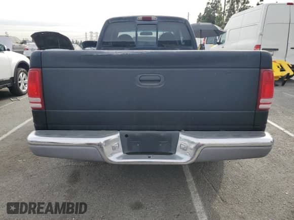 1998 Dodge Dakota SLT z VIN 1B7GL22Y1WS599671, wystawiony jako Copart lot #84451994 z przebiegiem 108 623 mil mil oraz Czysty tytuł • Clean title. Historia ofert i sprzedaży dostępna na DreamBid. Obrazek 6.