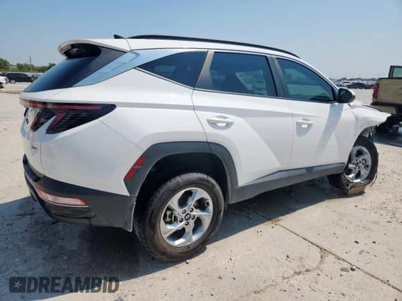 2023 Hyundai Tucson SEL z VIN 5NMJBCAE1PH259102, wystawiony jako Copart lot #71931035 z przebiegiem 50 181 mil mil oraz Czysty tytuł • Clean title. Historia ofert i sprzedaży dostępna na DreamBid. Obrazek 3.