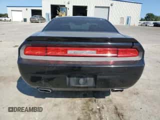 2012 Dodge Challenger SXT z VIN 2C3CDYAG4CH118276, wystawiony jako Copart lot #70877304 z przebiegiem 118 691 mil mil oraz Szkoda całkowita • Salvage title. Historia ofert i sprzedaży dostępna na DreamBid. Obrazek 6.