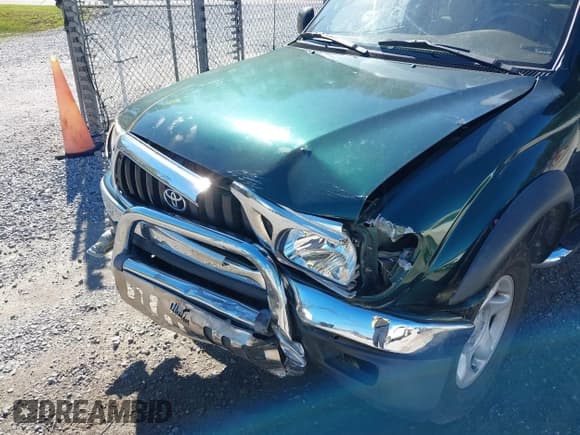 ✅ 2001 Toyota Tacoma PreRunner • VIN: 5TEGN92N91Z788372 • Lot: 41802743. Listed on IAAI with 218,746 mi. Free auction sales archive from the USA and detailed vehicle history report at DreamBid. Image 6.