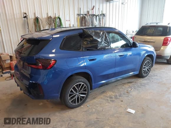 ✅ 2023 BMW X1 xDrive28i • VIN: WBX73EF00P5W58167 • Lot: 42930953. Listed on IAAI with 34,505 mi. Free auction sales archive from the USA and detailed vehicle history report at DreamBid. Image 4.
