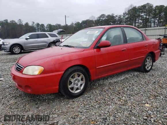 ✅ 2003 Kia Spectra • VIN: KNAFB121535245946 • Лот: 45688365. Опубликован ранее на Copart с пробегом 196 338 миль. Бесплатный доступ к архиву аукционных продаж из США и подробный отчёт об истории автомобиля на DreamBid. Изображение 1.