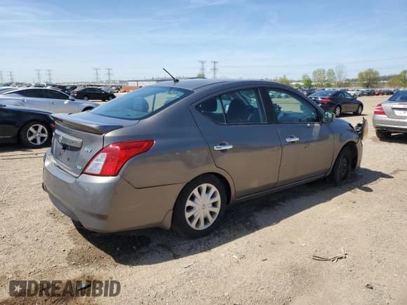 ✅ 2015 Nissan Versa SV • VIN: 3N1CN7AP4FL945793 • Lot: 56026235. Listed on Copart with 116,987 mi. Free auction sales archive from the USA and detailed vehicle history report at DreamBid. Image 3.