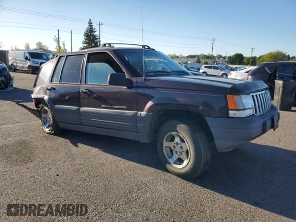 ✅ 1996 Jeep Grand Cherokee Laredo • VIN: 1J4GZ58S4TC213568 • Lot: 85765615. Listed on Copart with Not provided. Free auction sales archive from the USA and detailed vehicle history report at DreamBid. Image 4.
