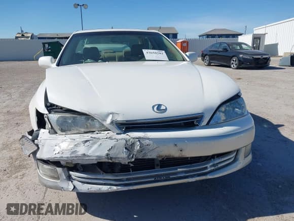 ✅ 2000 Lexus ES 300 • VIN: JT8BF28G4Y5102497 • Лот: 43650282. Опубликован ранее на IAAI с пробегом 128 348 миль. Бесплатный доступ к архиву аукционных продаж из США и подробный отчёт об истории автомобиля на DreamBid. Изображение 6.