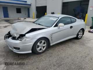 ✅ 2006 Hyundai Tiburon GS • VIN: KMHHM65D16U219309 • Лот: 86110765. Опубликован ранее на Copart с пробегом 166 452 миль. Бесплатный доступ к архиву аукционных продаж из США и подробный отчёт об истории автомобиля на DreamBid. Изображение 1.