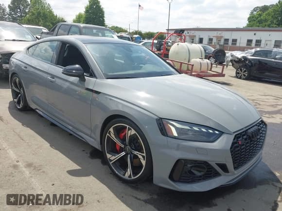 ✅ 2022 Audi RS 5 Sportback • VIN: WUAAWCF5XNA900738 • Lot: 42064377. Listed on IAAI with 29,620 mi. Free auction sales archive from the USA and detailed vehicle history report at DreamBid. Image 1.
